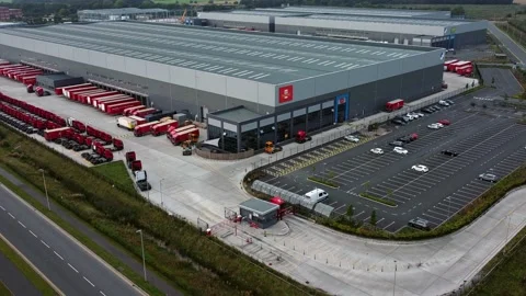 Aerial view parcel post shipping hub logistics lorry cargo containers Stock Footage 162259806