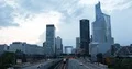 Aerial View of Paris City La Defense Skyline Cars Traffic on Busy Street Dusk 4k or 4k+ Resolution