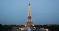 Aerial View of Paris City Skyline and Eiffel Tower Tourist Attraction Dusk Light 4k or 4k+ Resolution
