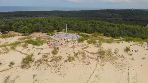 Aerial view of the Parnidis Dune and Sun Clock in Nida, Curonian Spit National P Stock Footage 321750797
