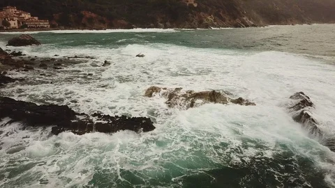 Aerial view. Passage above Waves moving on the rocks Stock Footage 100330316