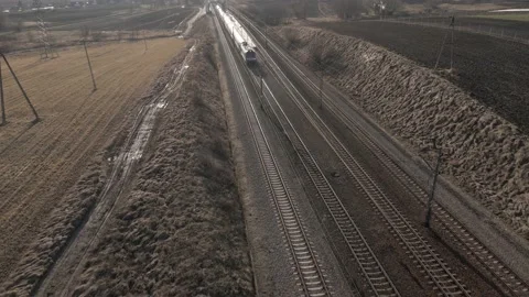 Aerial view of passanger train on a sunny day Stock Footage 219744619
