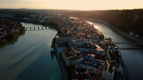 Aerial view of Passau old town at the confluence of three rivers at sunset Stock Footage 340454434