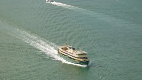 Aerial View of Passenger Ferry Crossing Sydney Harbour with Distant Boat Stock Footage 345724005