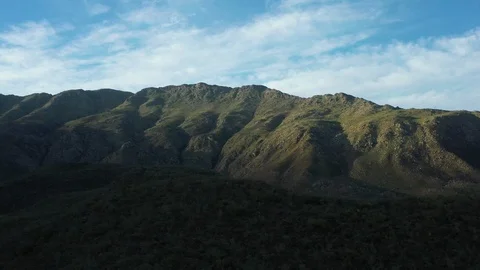 Aerial View passing over the mountains of the Langeberg Valley, South Africa Stock Footage 124464418