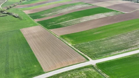 Aerial view of patchwork agricultural fields, France. 스톡 동영상 332704708