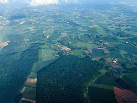 Aerial view of patchwork farmland and forest near Paris, France showing rur.. Stock Photos