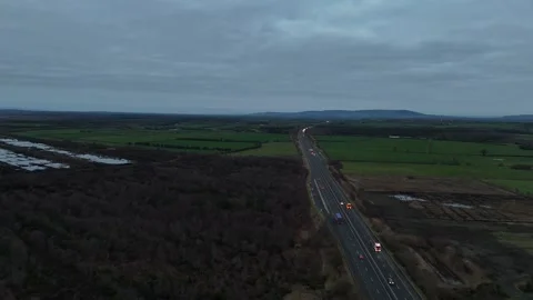 Aerial View of Patchwork Farmland in Late Season Rural Landscape Stock Footage 332570831