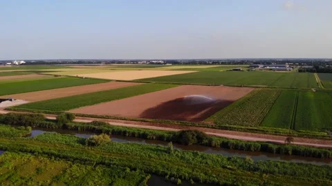 Aerial View Of Patchwork Farmland In Puttershoek With Field Being Stock Footage 169208799