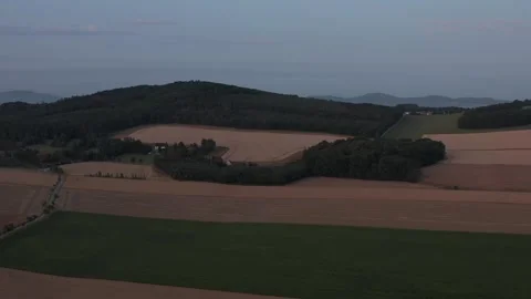Aerial View of Patchwork Farmland with Rolling Hills Rural Landscape Vídeo Stock 347647835