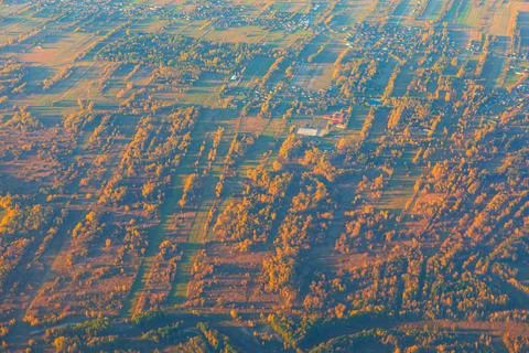 Aerial view of patchwork of farmland in sunlight 스톡 사진