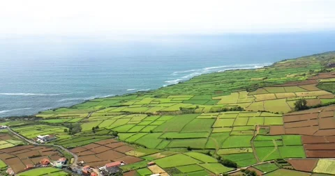 Aerial View of Patchwork Fields And Blue Sea In Azores, Terceira Island. - Video stock 234528732