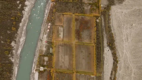 Aerial view of patchwork fields and river, Pakistan. Stock Footage 281369081
