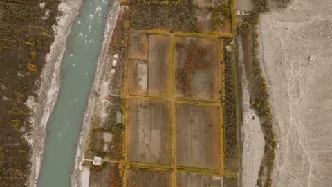 Aerial view of patchwork fields and river, Pakistan. Stock Footage 312834333
