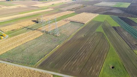 Aerial view of patchwork fields with varying shades of green and brown, Fotos de archivo