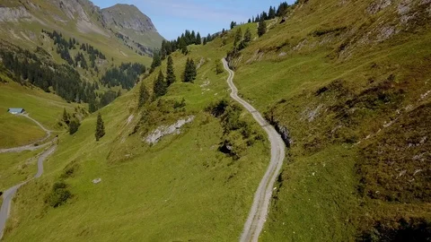 Aerial view of path leading up a mountain. Stock Footage 107085584