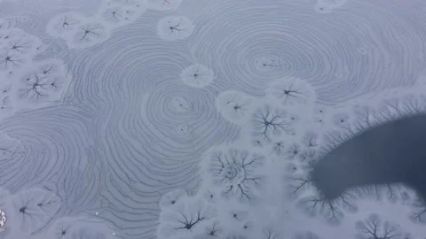 Aerial View Patterns On Ice Near The Shore Stock Footage 168361555