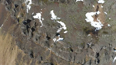 Aerial view of patterns of Icelandic rivers flowing into the ocean. Iceland in Stock Footage 124869051