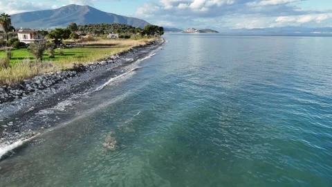 Aerial view of the pebbly beach of Agios Andreas, Greece Video stock 300269697