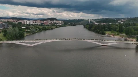Aerial View of the Pedro e Ines Footbridge Over the Mondego River Stock-Footage 345840314