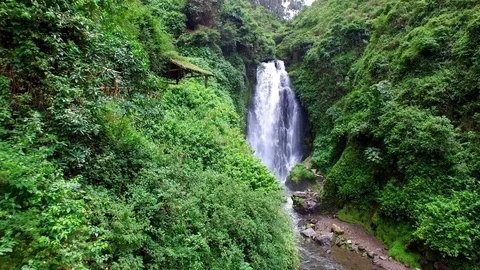 Aerial view of Peguche Waterfall, Rain Forest, Otavalo, Ecuador Vídeo Stock 73056107