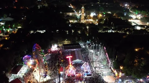 Aerial view of people having fun in amusement park and colorful toys, game Stock Footage 236463132