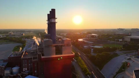 Aerial view of the Perry K. Generating Station steam plant during a golden Stock Footage 345626201