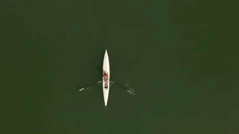 Aerial view of a person rowing a white scull boat, France. Stock Footage 337190908