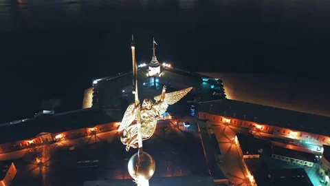 Aerial view of Peter and Paul Fortress spire with a gold cross and an angel, St Stock Footage 129204099