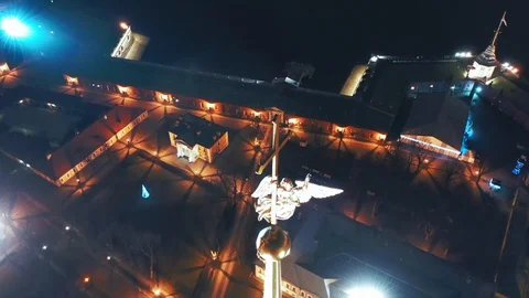 Aerial view of Peter and Paul Fortress spire with a gold cross and an angel, St Stock Footage 129205374