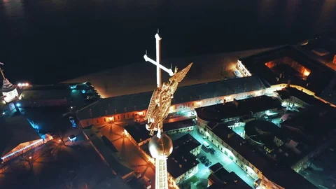 Aerial view of Peter and Paul Fortress spire with a gold cross and an angel, St Stock Footage 129205408