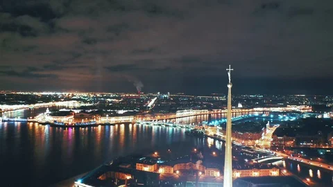 Aerial view of Peter and Paul Fortress spire with a gold cross and an angel, St Stock Footage 129704641