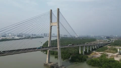 Aerial View of Phu My Bridge with Traffic Crossing a River in Ho Chi Minh City, Stock Footage 335576599
