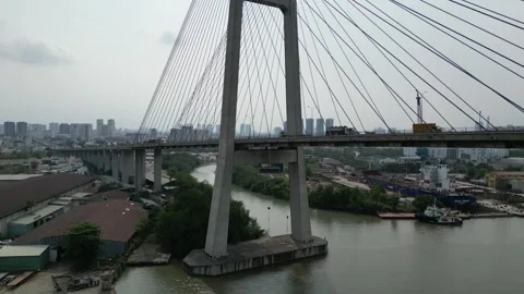 Aerial View of Phu My Bridge Traffic Over the Saigon River in Ho Chi Minh City, Stock Footage 335576933