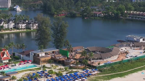 Aerial View of Phuket Beach with Clock Tower and Construction Site Stock Footage 297412963