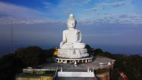 Aerial view of Phuket Big Buddha statue at sunrise filmed by drone capturing Stock Footage 344086327