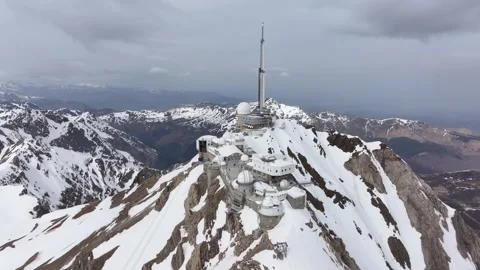 Aerial view of the Pic du Midi in the Pyrenees in winter by drone 02 Stock Footage 291936860