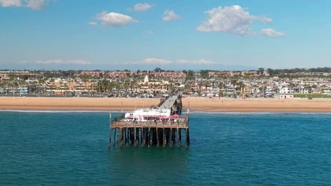 Aerial view of pier in Newport Beach, Orange County, California on a sunny day. Stock Footage