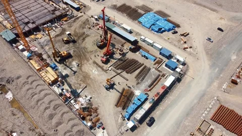 Aerial view of piling rig working on a building foundation site Stock Footage 345961310
