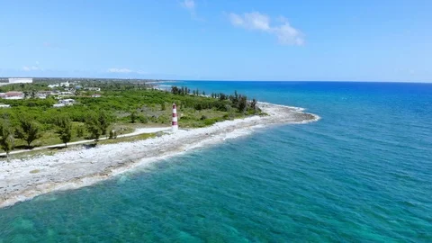 Aerial View of Pinders Point Lighthouse Shore, Grand Bahama, Bahamas Stock Footage 106337651