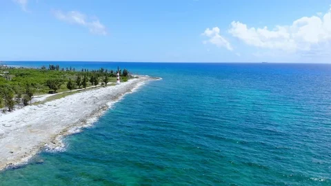 Aerial View of Pinders Point Lighthouse Shore, Grand Bahama, Bahamas Stock Footage 106337944