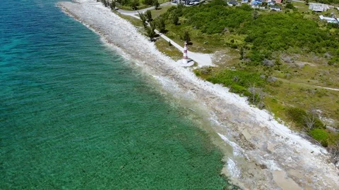 Aerial View of Pinders Point Lighthouse Shore, Grand Bahama, Bahamas Stock Footage 106338047