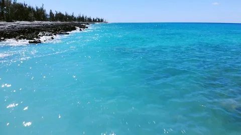 Aerial View of Pinders Point Lighthouse and Waves on Rocky Shore, Bahamas Видео 107295537