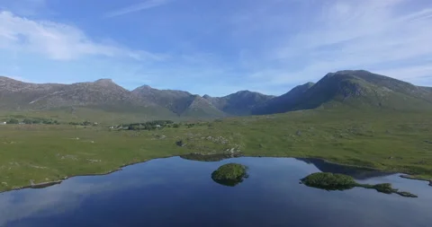 Aerial view of Pine Trees Island, Derryclare Lough - Lake, Galway, Ireland Stock Footage 148750470