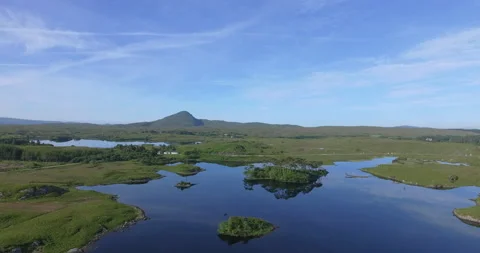 Aerial view of Pine Trees Island, Derryclare Lough - Lake, Galway, Ireland Stock Footage 148751332