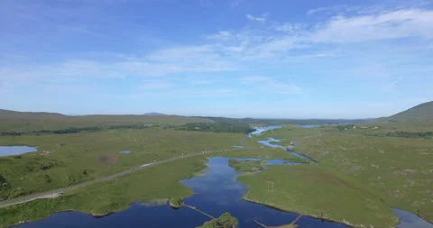 Aerial view of Pine Trees Island, Derryclare Lough - Lake, Galway, Ireland Stock Footage 148751698