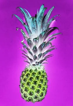 Aerial view of pineapple in negative filter pink background Foto stock