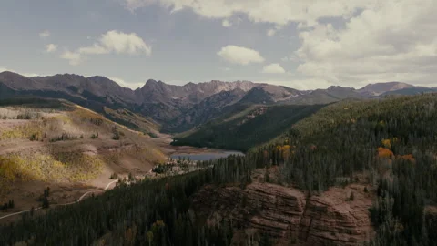 Aerial View of Piney Lake and Gore Mountain Range in Vail Colorado Fall Colors Stock Footage 252158145
