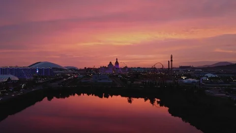 Aerial view pink clouds during sunset above Sochi Park, Bogatyr hotel Video stock 111781277