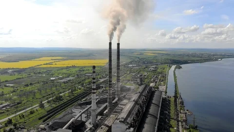 Aerial view Pipe teleplastic that emit black smoke, on the background of Stock Footage 112671156